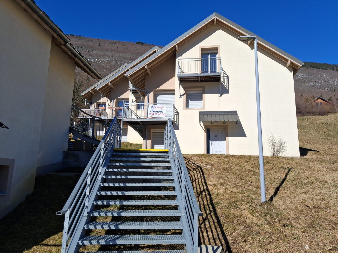 Entrée d'un logement destiné à la vente HLM